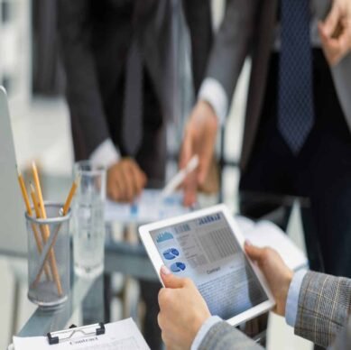 Business adviser analyzing financial figures denoting the progress in the work of the company