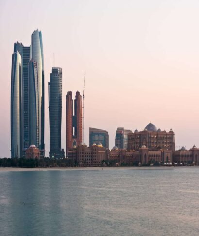 Abu Dhabi buildings skyline from the sea Abu Dhabi buildings skyline