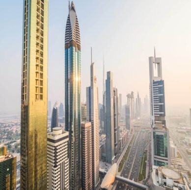 Dubai, UAE - October, 2018. Dubai skyline and downtown skyscrapers on sunset. Modern architecture with highrise buildings on world famous metropolis in United Arab Emirates