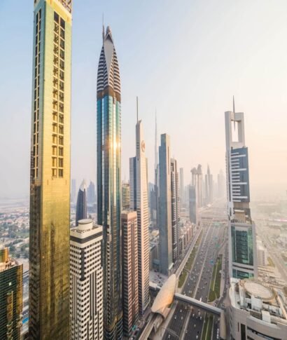 Dubai, UAE - October, 2018. Dubai skyline and downtown skyscrapers on sunset. Modern architecture concept with highrise buildings on world famous metropolis in United Arab Emirates Dubai, UAE - October, 2018. Dubai skyline and downtown skyscrapers on sunset. Modern architecture with highrise buildings on world famous metropolis in United Arab Emirates