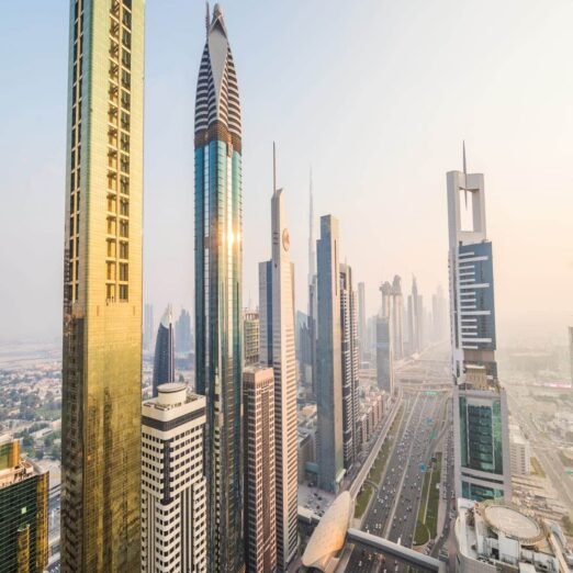 Dubai, UAE - October, 2018. Dubai skyline and downtown skyscrapers on sunset. Modern architecture concept with highrise buildings on world famous metropolis in United Arab Emirates Dubai, UAE - October, 2018. Dubai skyline and downtown skyscrapers on sunset. Modern architecture with highrise buildings on world famous metropolis in United Arab Emirates