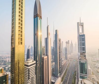 Dubai, UAE - October, 2018. Dubai skyline and downtown skyscrapers on sunset. Modern architecture with highrise buildings on world famous metropolis in United Arab Emirates